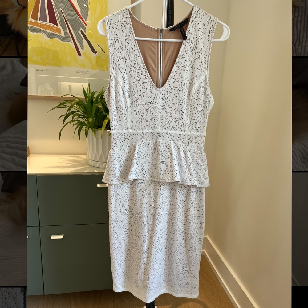 BCBG lace overlay sheath dress with peplum detail